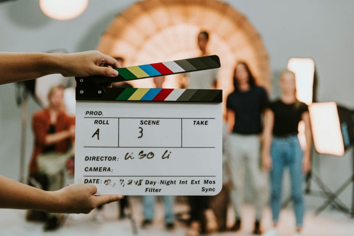 What is Film Insurance - Holding a Movie Production Clapperboard