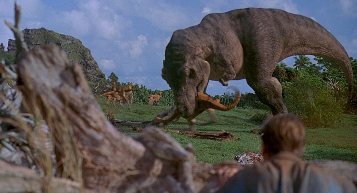 Where Was Jurassic Park Filmed - Sam Neill Watching a T-Rex
