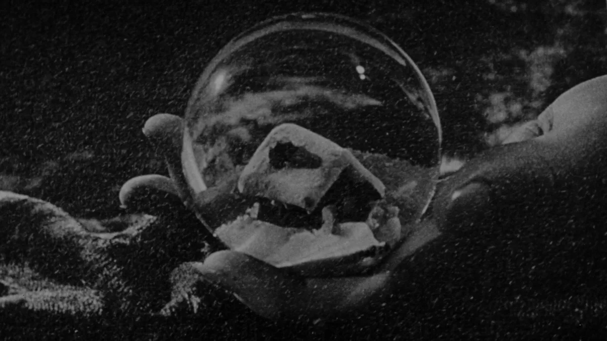 The snow globe falls from Charles Foster Kane's hand in the opening of Citizen Kane (1941)