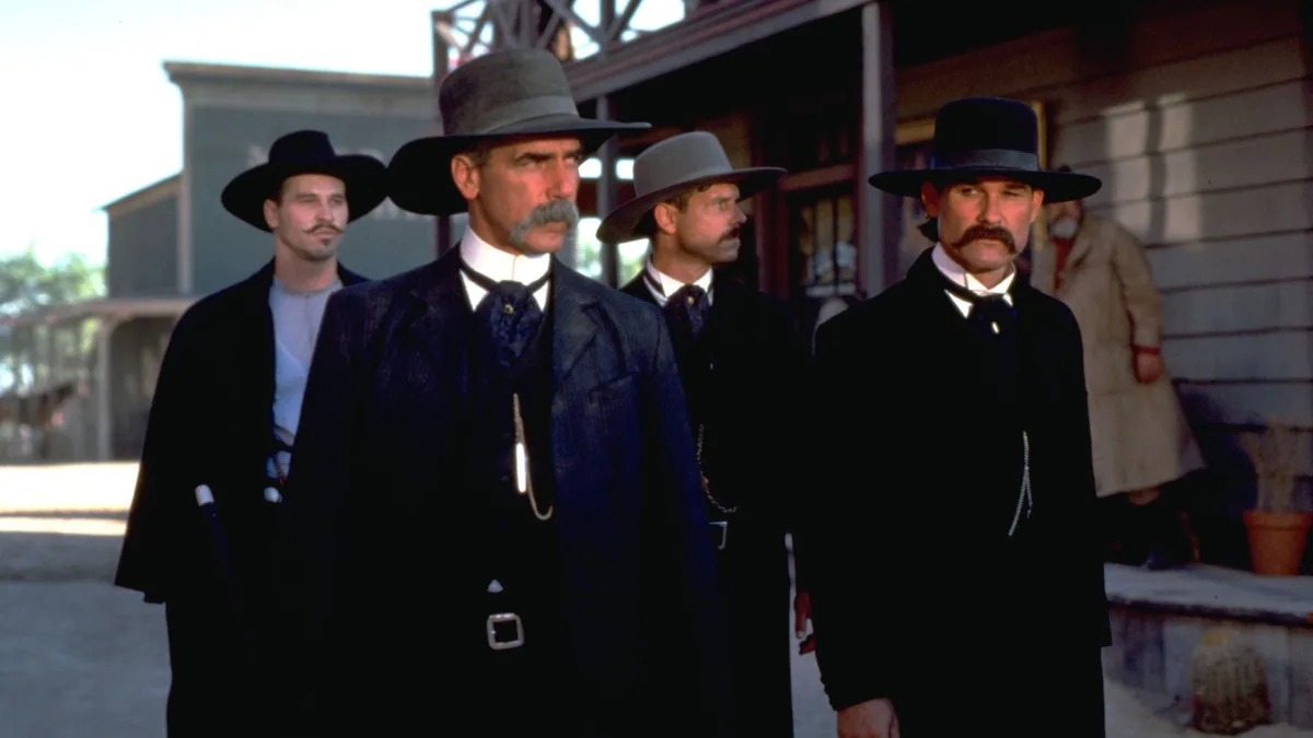 Cowboy shot of the Earp brothers and Doc Holliday in Tombstone (1993)